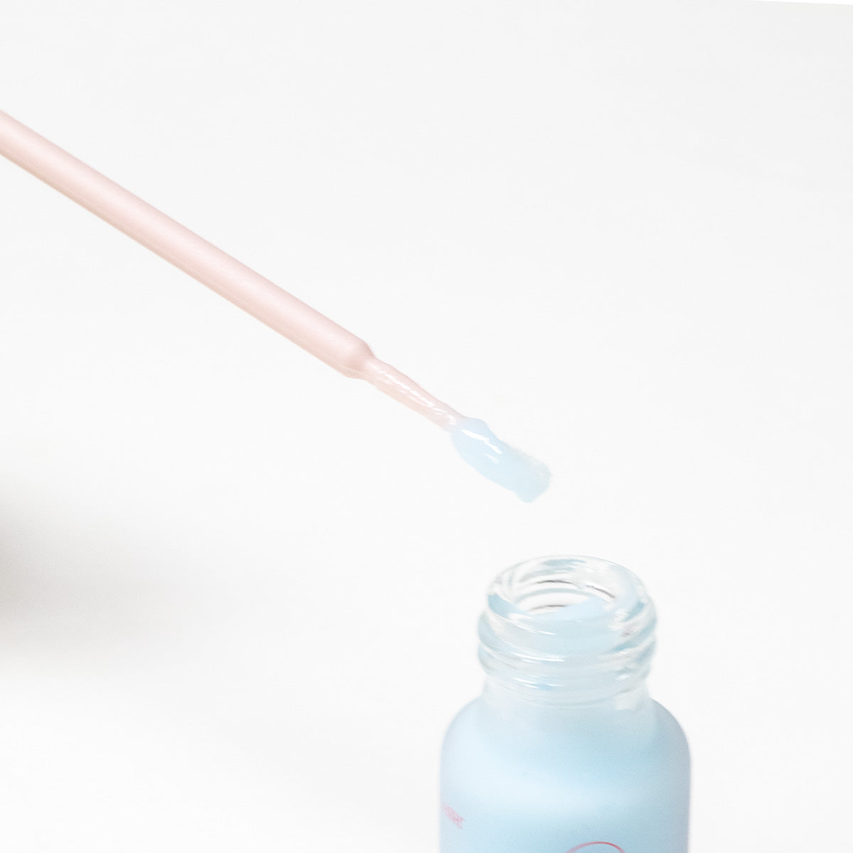 (Lotion 2) Fixer la bouteille de dose